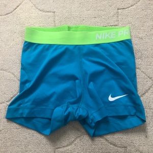 Blue/neon green nike pro spandex